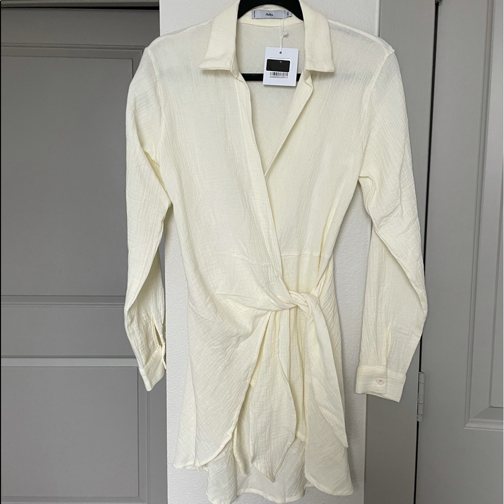 NEW WITH TAGS!!!! Adika wrap long sleeve dress